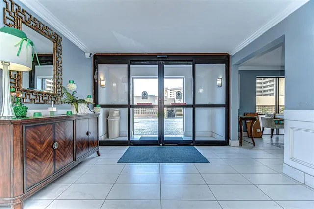 a view of lobby with furniture and large windows
