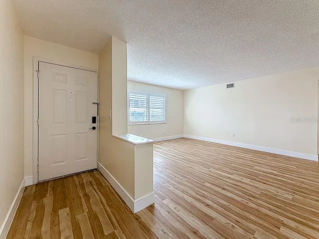 $270,000 | 8198 Terrace Garden Drive North, Unit 407, St. Petersburg, FL 33709