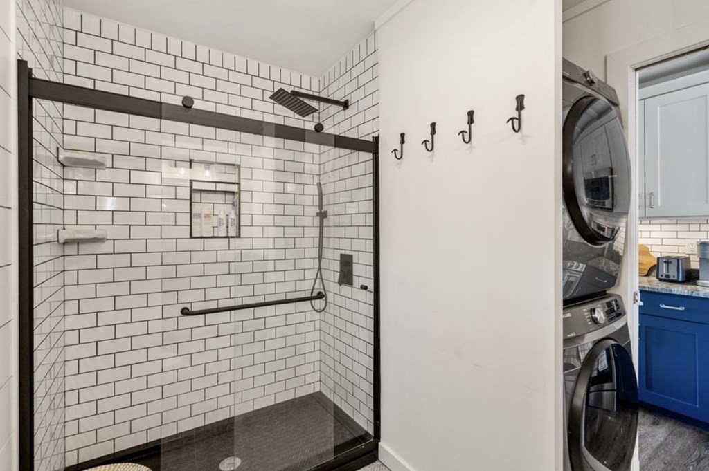 1 Pier 8, Unit BH Boston, MA 02129 - Photo 13 of 18 a bathroom with a shower