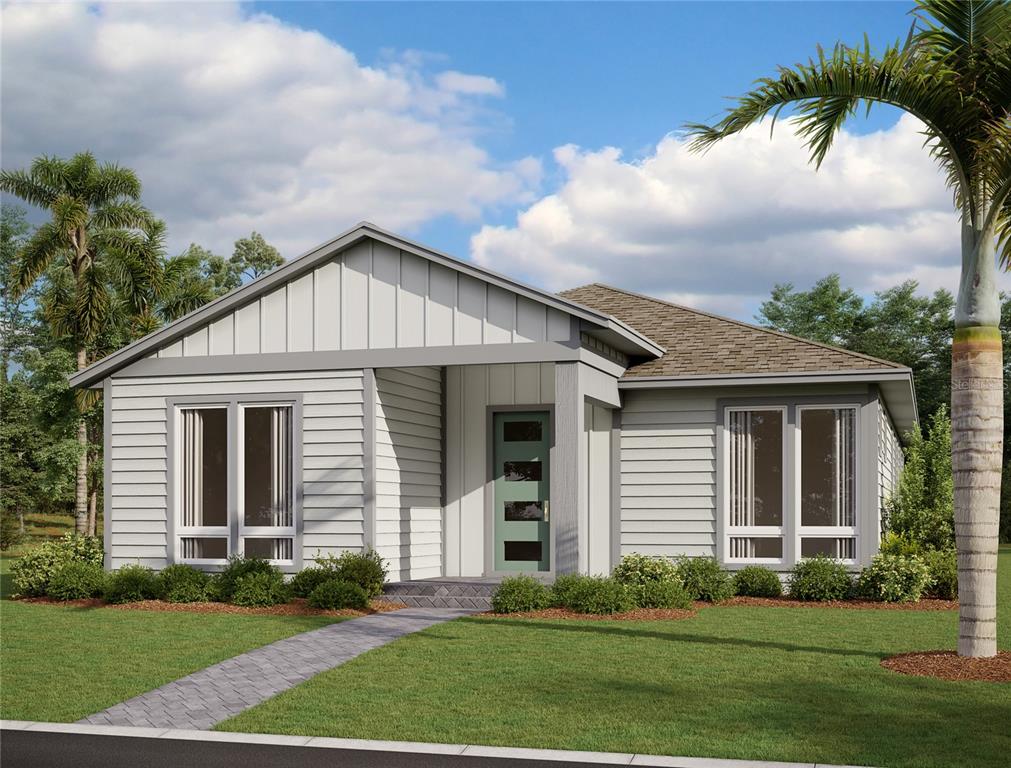 6482 Rover Way St. Cloud, FL 34771 - Photo 1 of 1 a front view of a house with a garden