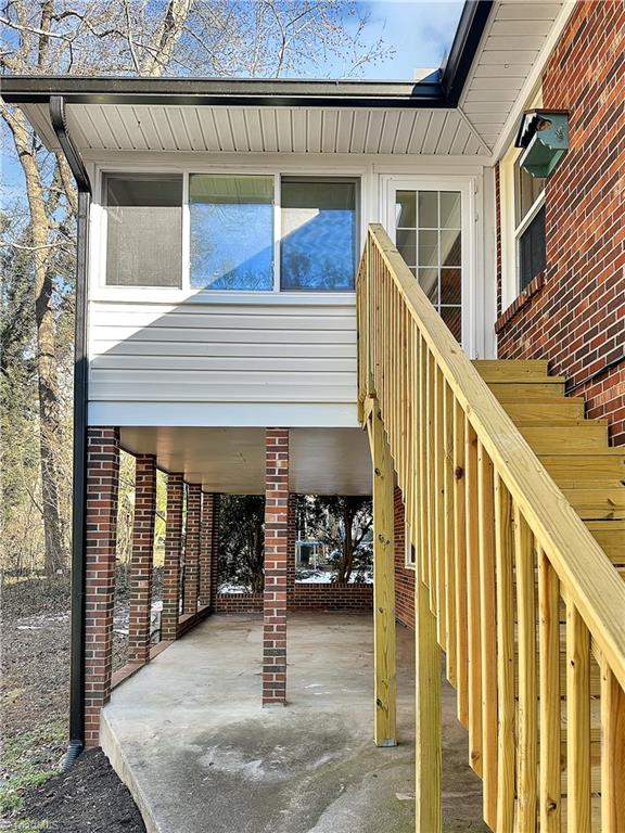 248 Barons Road Clemmons, NC 27012 - Photo 31 of 36 Sunroom ad patio