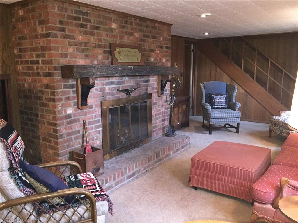 800 Shamrock Road High Point, NC 27265 - Photo 16 of 23 Lower level Den with fireplace and custom mantle