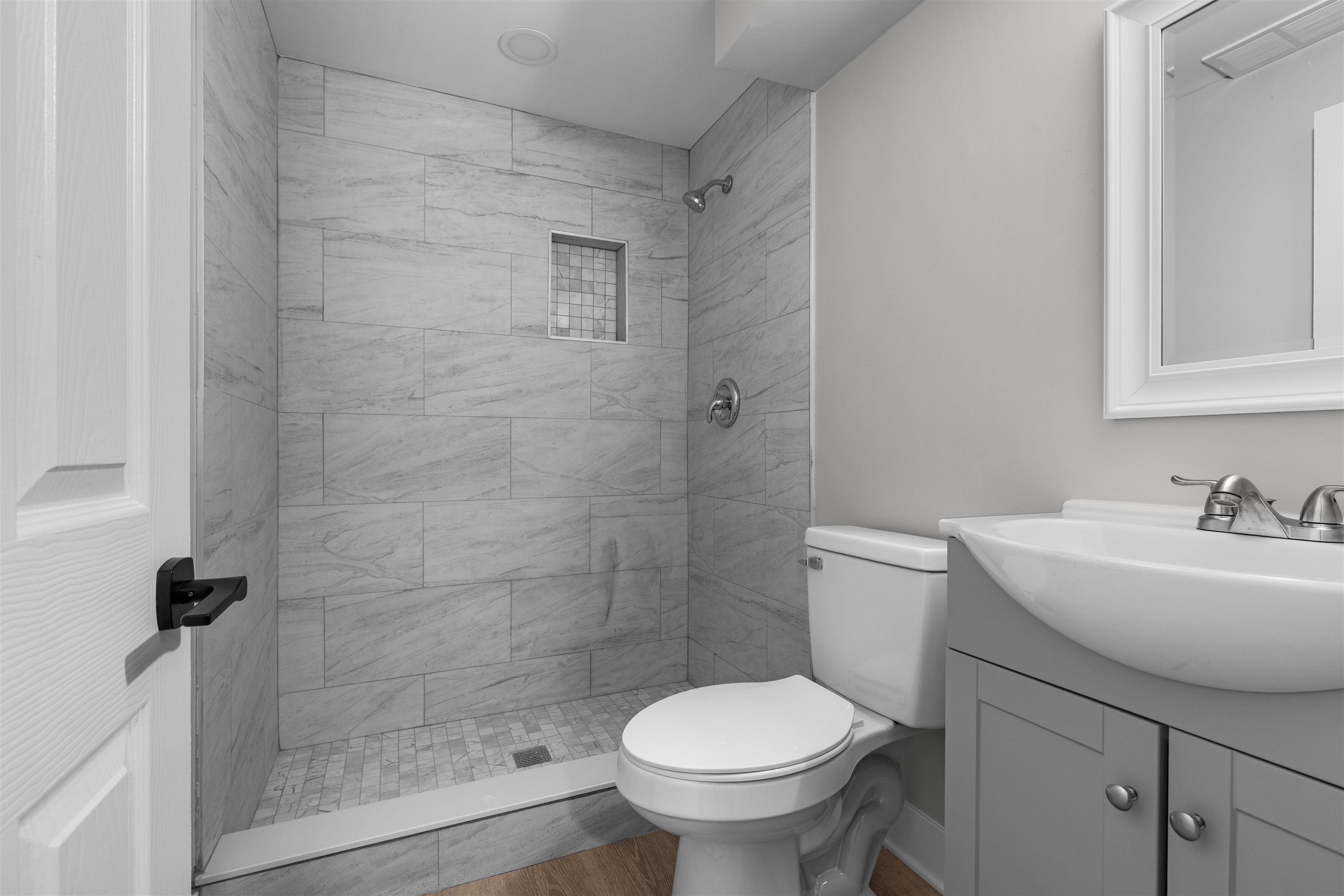 2718 Norway Pine Road Rockford, IL 61109 - Photo 7 of 12 a bathroom with a sink toilet and a mirror