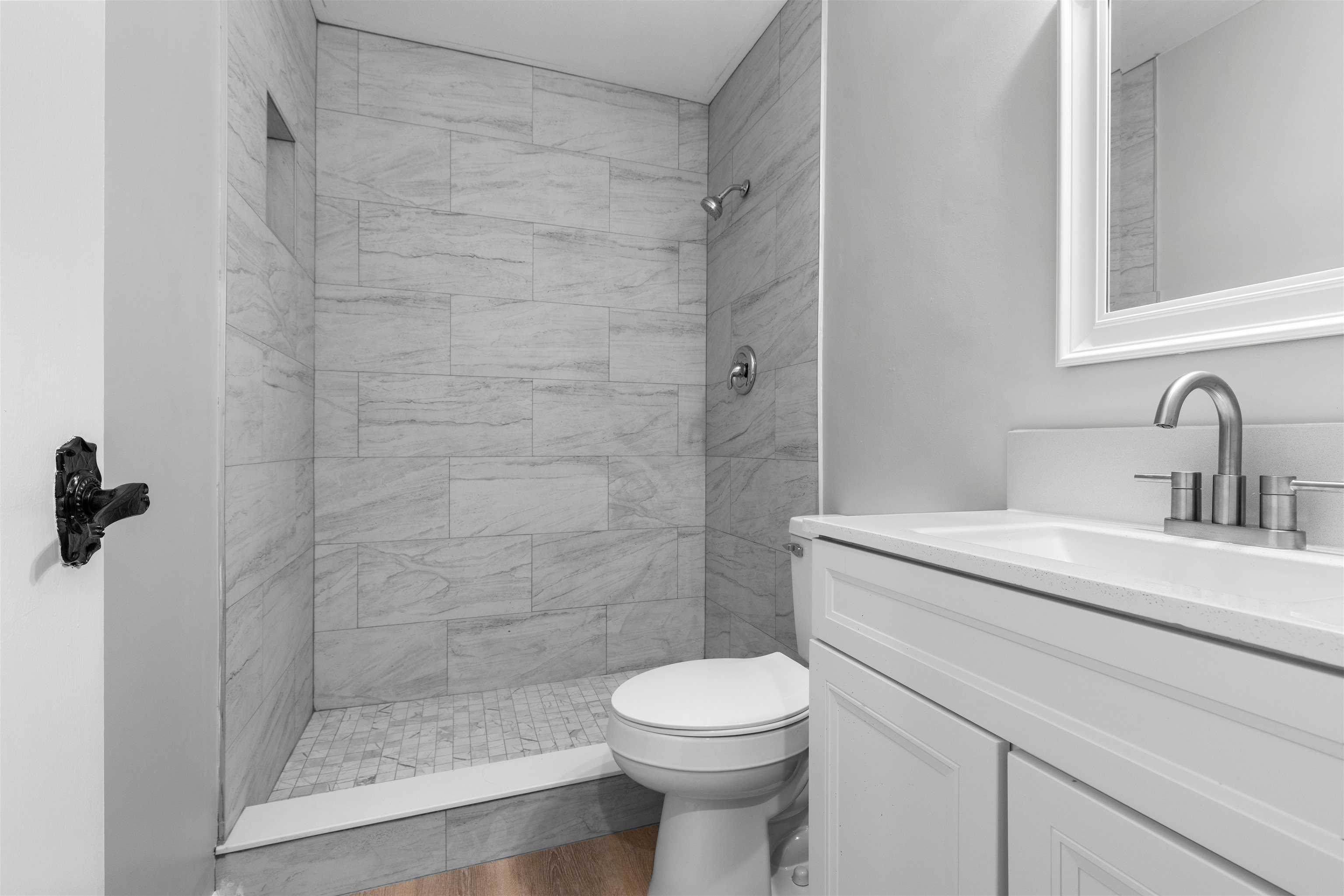 2718 Norway Pine Road Rockford, IL 61109 - Photo 10 of 12 a bathroom with a sink toilet and shower