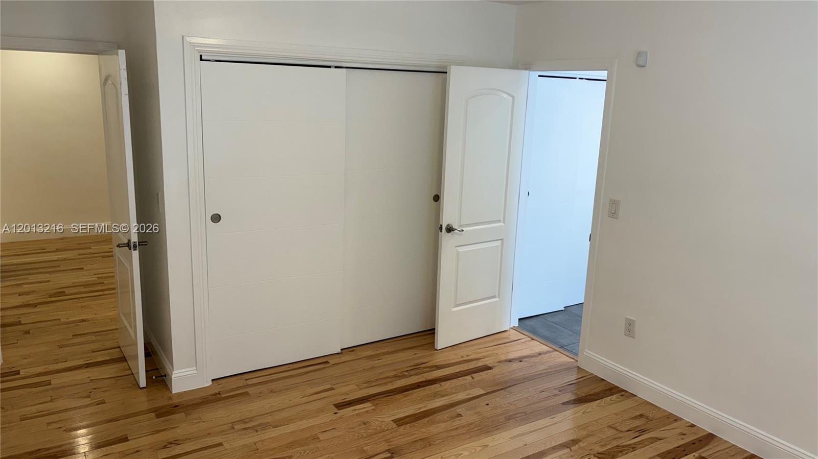250 Southwest 19th Road Miami, FL 33129 - Photo 9 of 22 a view of empty room with wooden floor