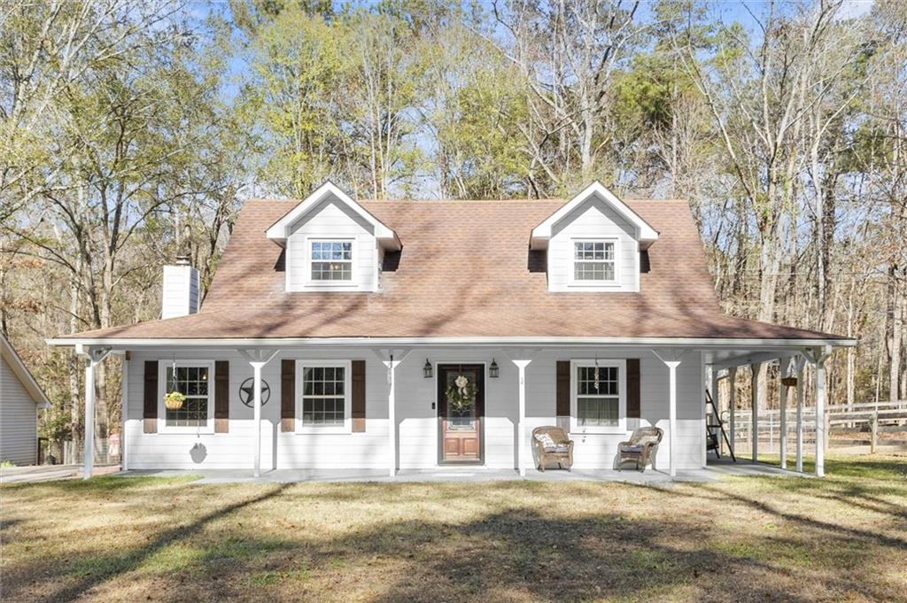 540 Cedar Drive Covington, GA 30016 - Photo 1 of 1 a front view of a house with a yard
