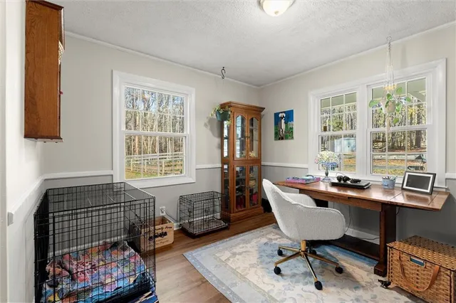 a room with furniture and a window