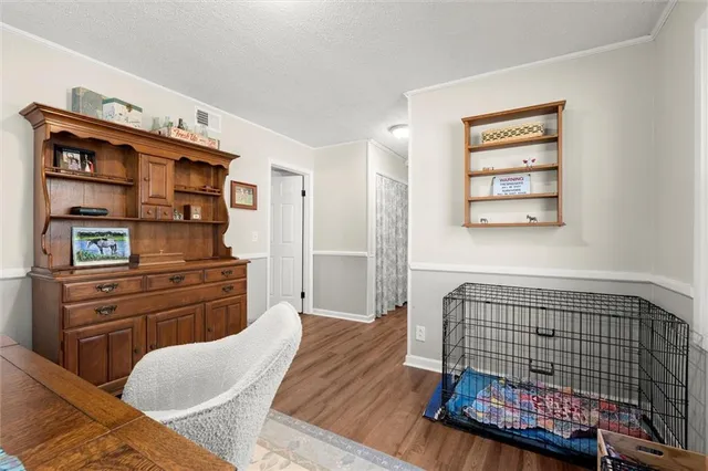 a bedroom with a bed and furniture