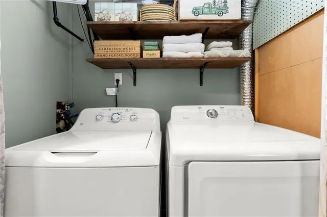 a utility room with dryer and washer
