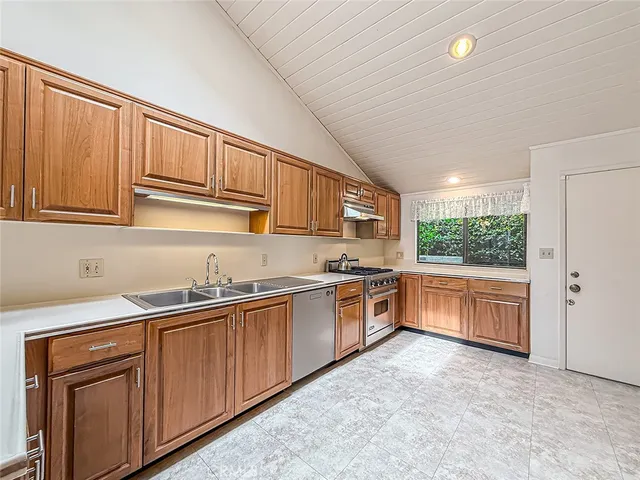 a view of a yard with trees