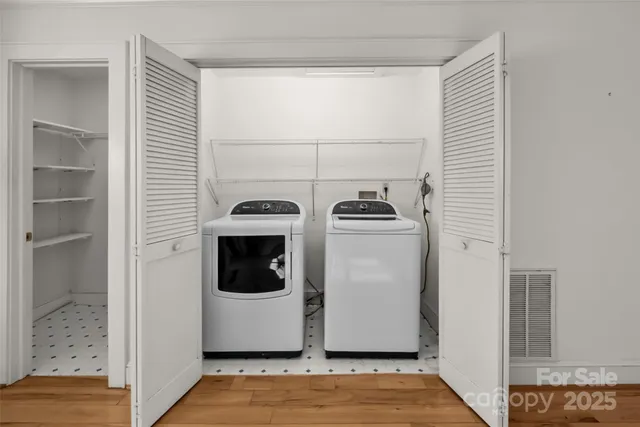 a utility room with dryer and washer