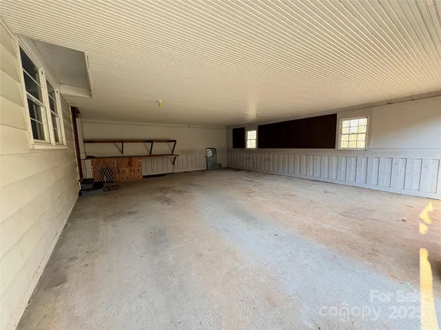 a view of a big room with staircase