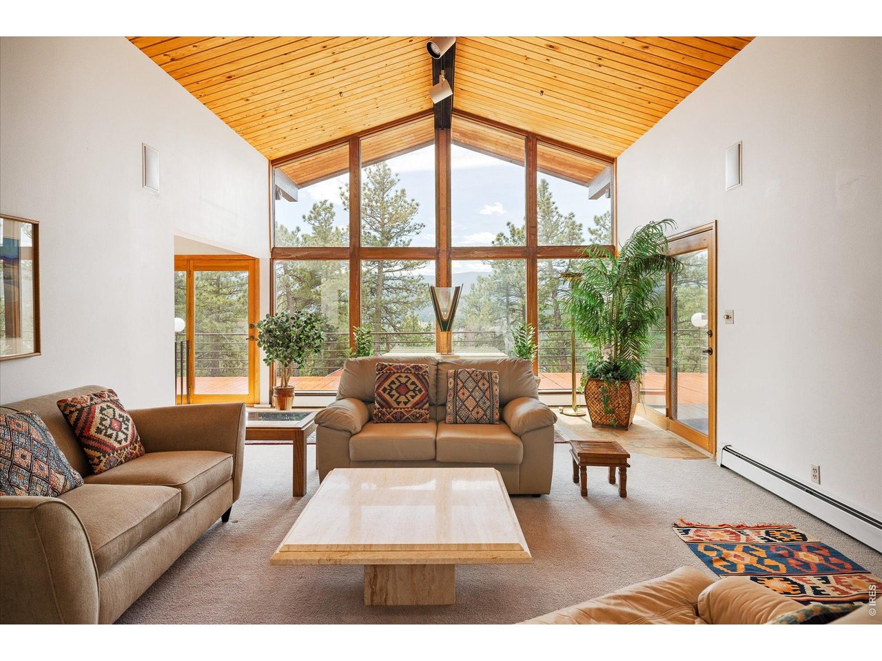 135 Poorman Road Boulder, CO 80302 - Photo 16 of 50 a living room with furniture and a large window