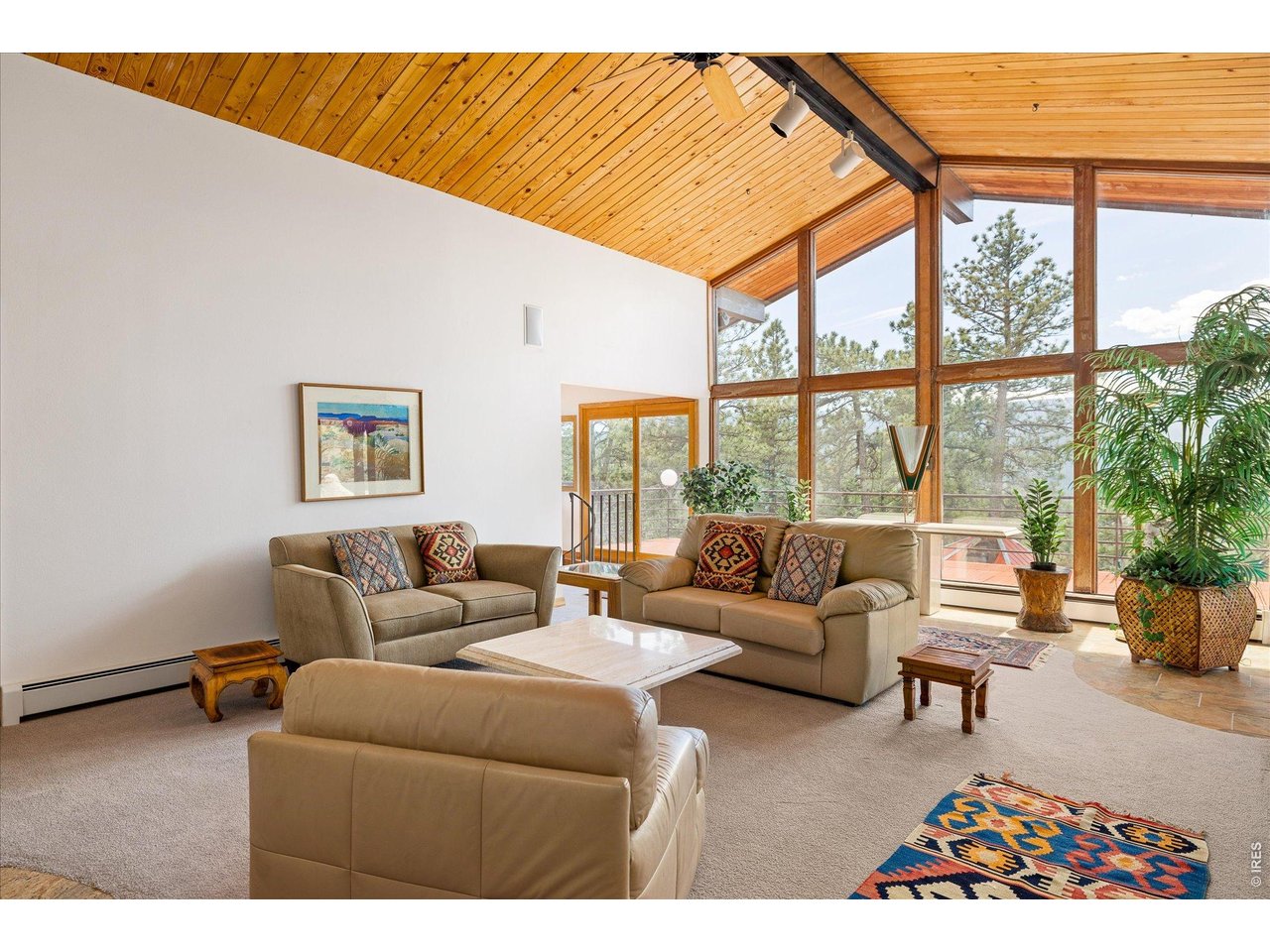 135 Poorman Road Boulder, CO 80302 - Photo 17 of 50 a living room with furniture and a large window
