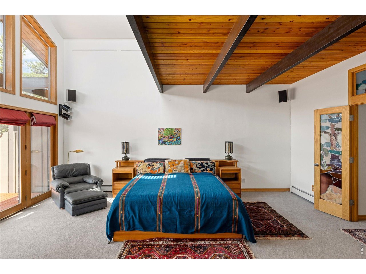 135 Poorman Road Boulder, CO 80302 - Photo 25 of 50 a bedroom with furniture and workout equipment
