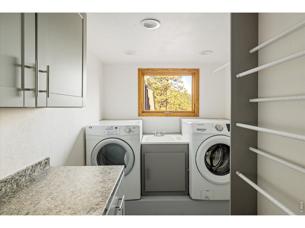 135 Poorman Road Boulder, CO 80302 - Photo 39 of 50 a utility room with dryer and washer