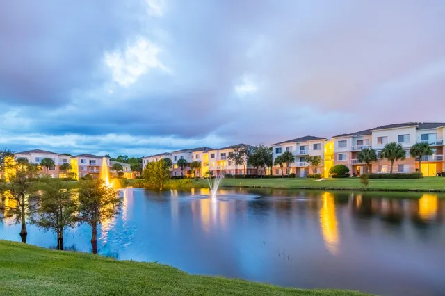 a view of a lake with a city