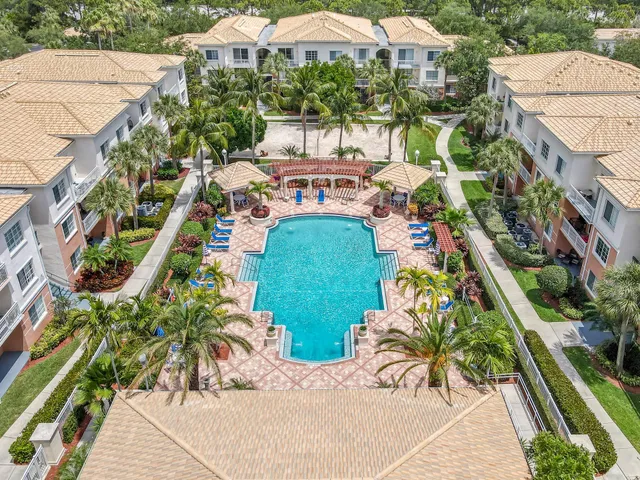 a view of a swimming pool with a patio