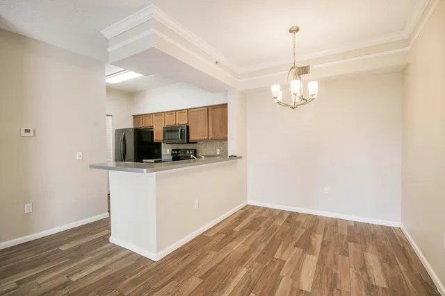 a view of a kitchen from the hallway