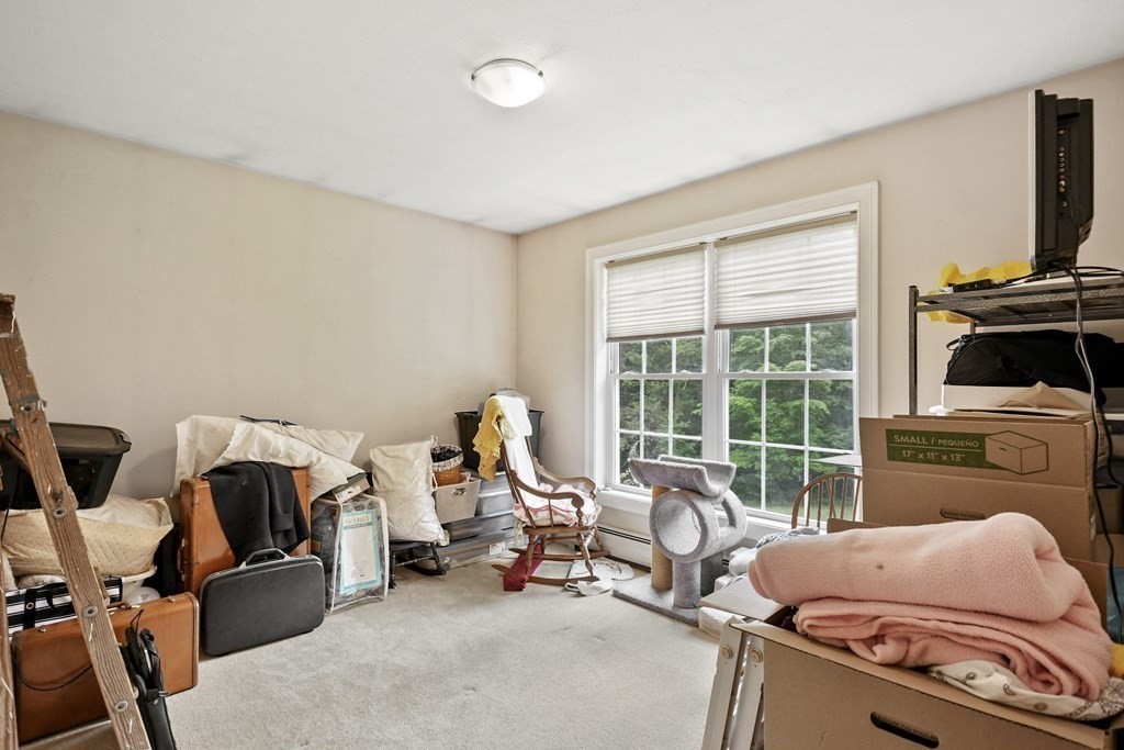 123 Red Gate Lane Rindge, NH 03461 - Photo 28 of 37 a bedroom with furniture and a window