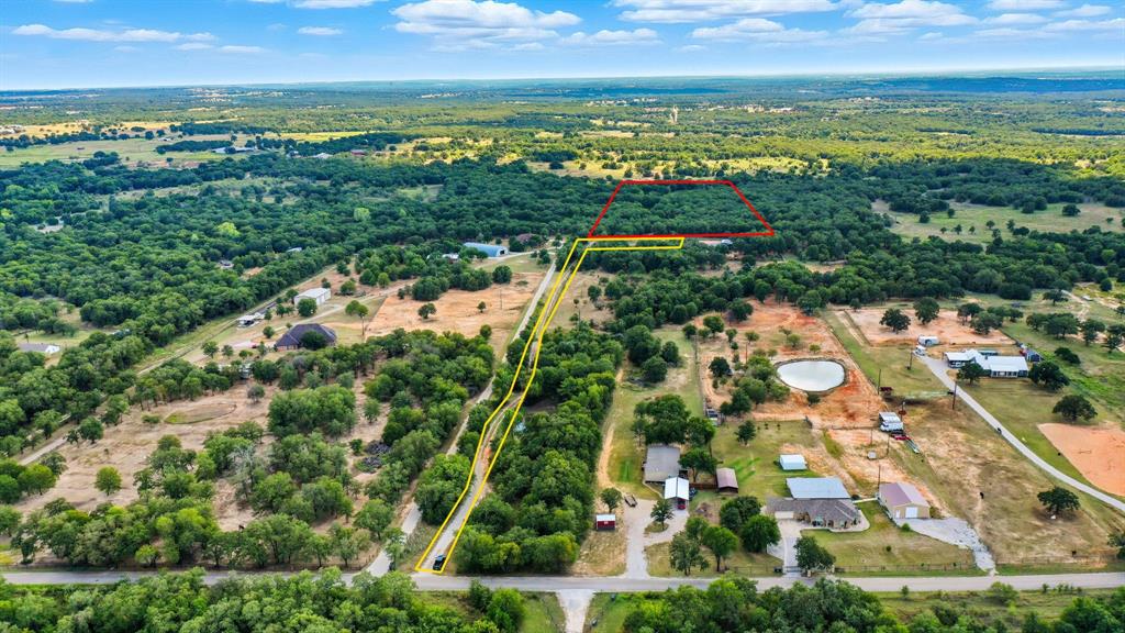 785 Jordan Road Poolville, TX 76487 - Photo 3 of 17 View of rural area featuring property parcel outlined