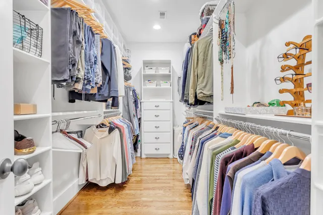 a bathroom with a sink double vanity granite toilet tub and shower