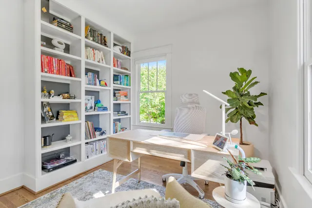 a utility room with sink dryer and washer