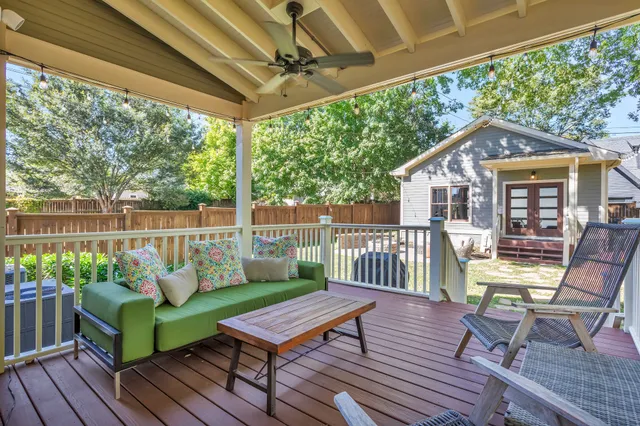 a view of a livingroom with furniture and lounge chair