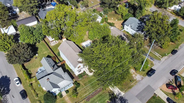a car parked in front of a house