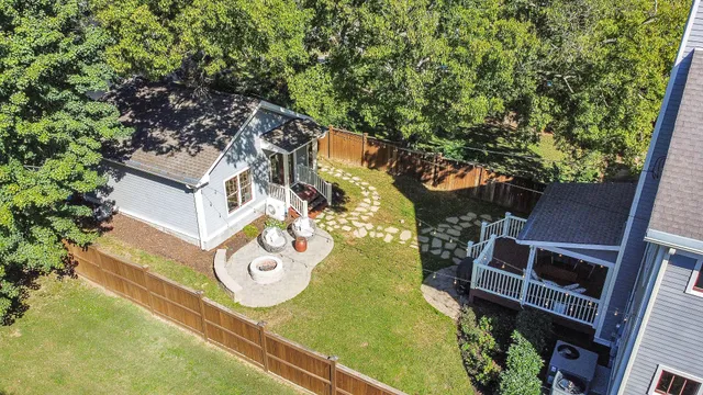 an outdoor sitting area with an umbrella