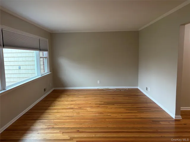 a view of an empty room and window