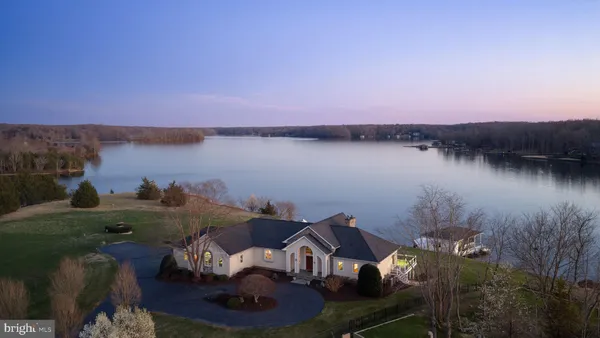a view of a lake with a house