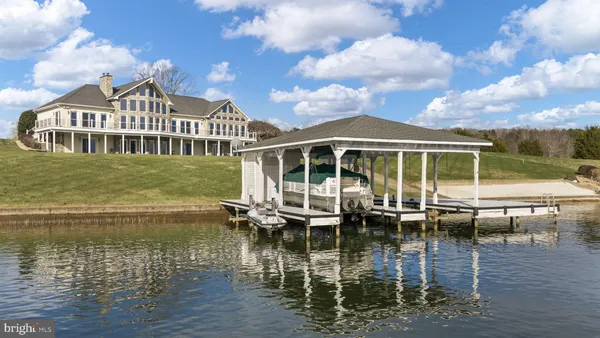 a view of a lake and a yard