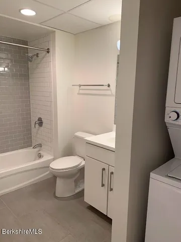 a blue chair sitting on top of a shelf