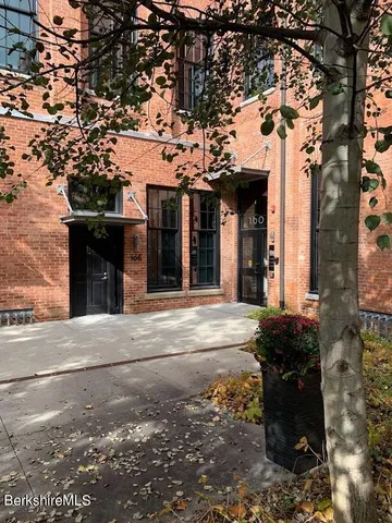 front view of a building and a street view