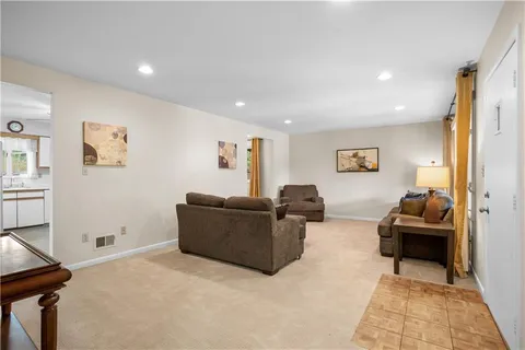 a living room with furniture and a couch