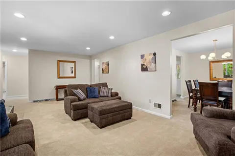 a living room with furniture and a couch