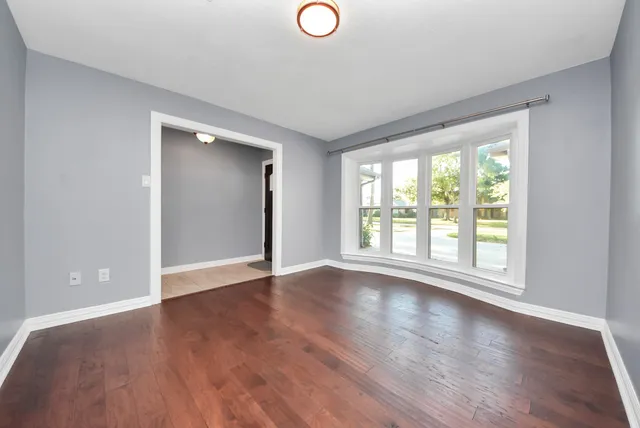 a view of livingroom with hardwood floor and window