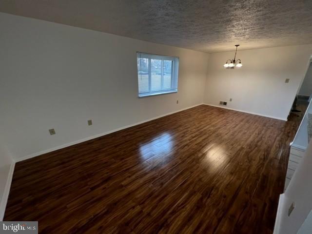 830 Heather Ridge Drive, Unit 22C Frederick, MD 21702 - Photo 5 of 22 Spacious living room w/gleaming hardwood floors.