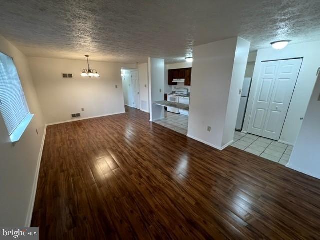 830 Heather Ridge Drive, Unit 22C Frederick, MD 21702 - Photo 6 of 22 Spacious, modern living area with warm tones.