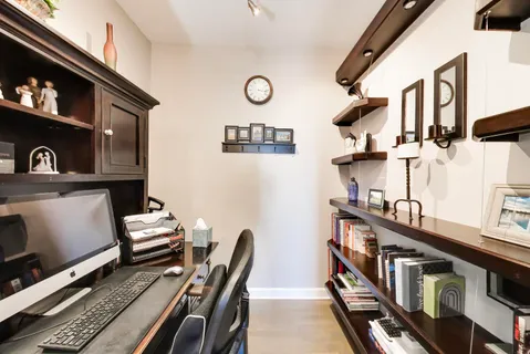 a view of a chairs and table in a kitchen
