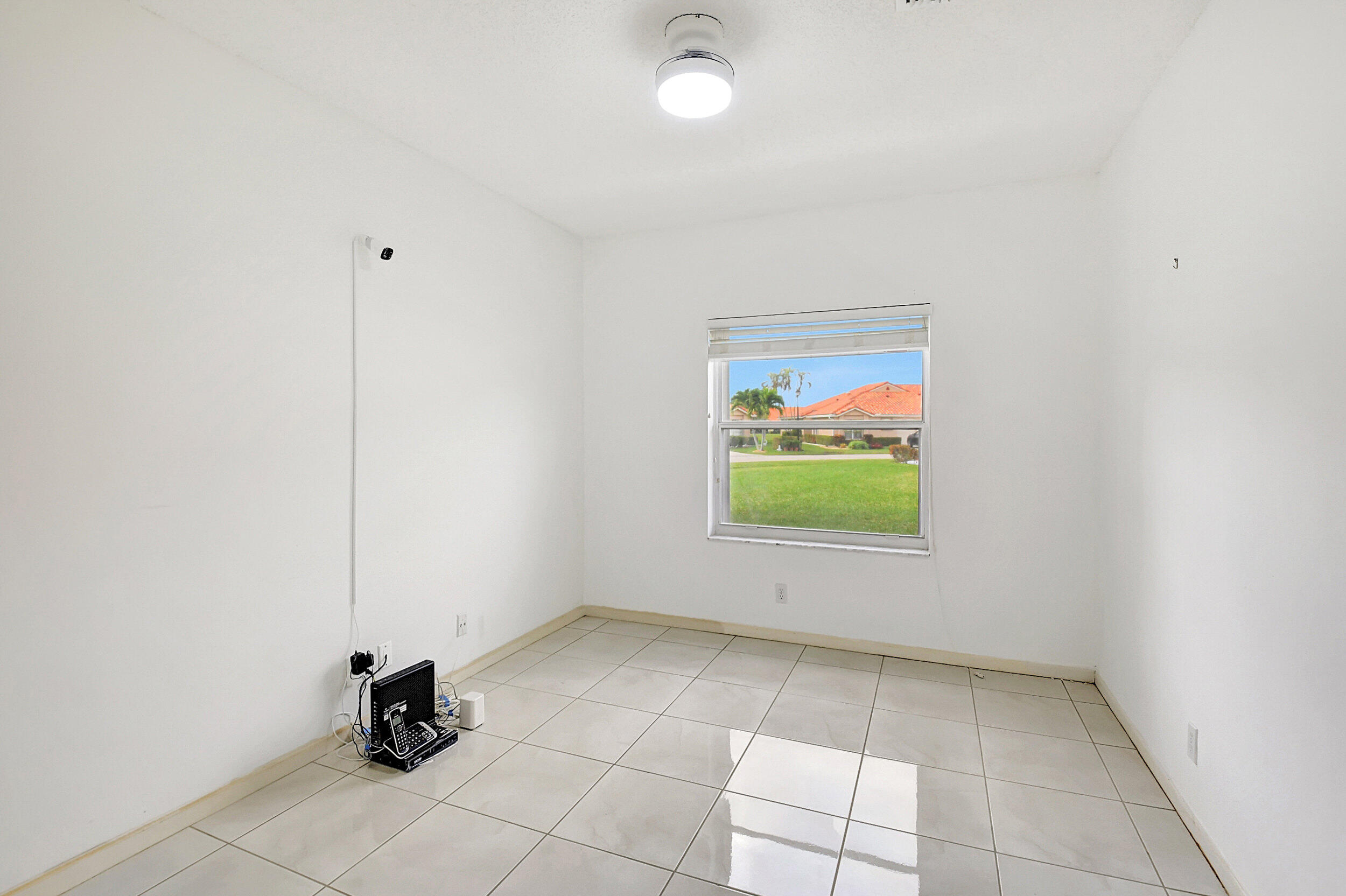 6340 Long Key Lane Boynton Beach, FL 33472 - Photo 15 of 29 a view of empty room with window