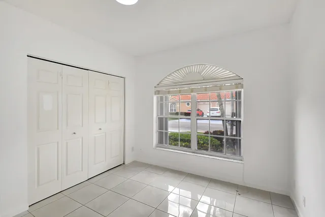 a view of empty room with windows