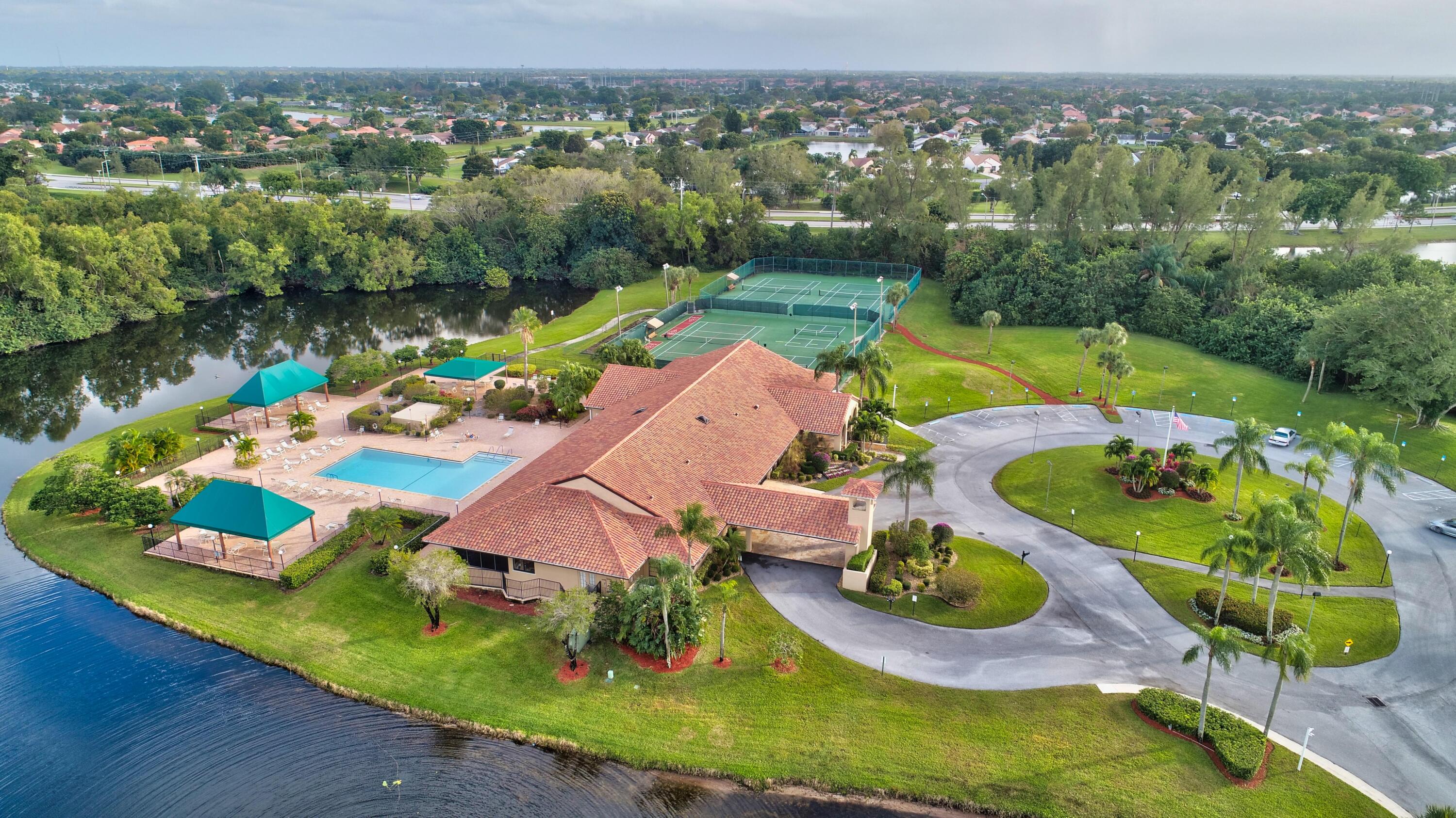 6340 Long Key Lane Boynton Beach, FL 33472 - Photo 29 of 29 an aerial view of a house with a swimming pool yard and outdoor seating