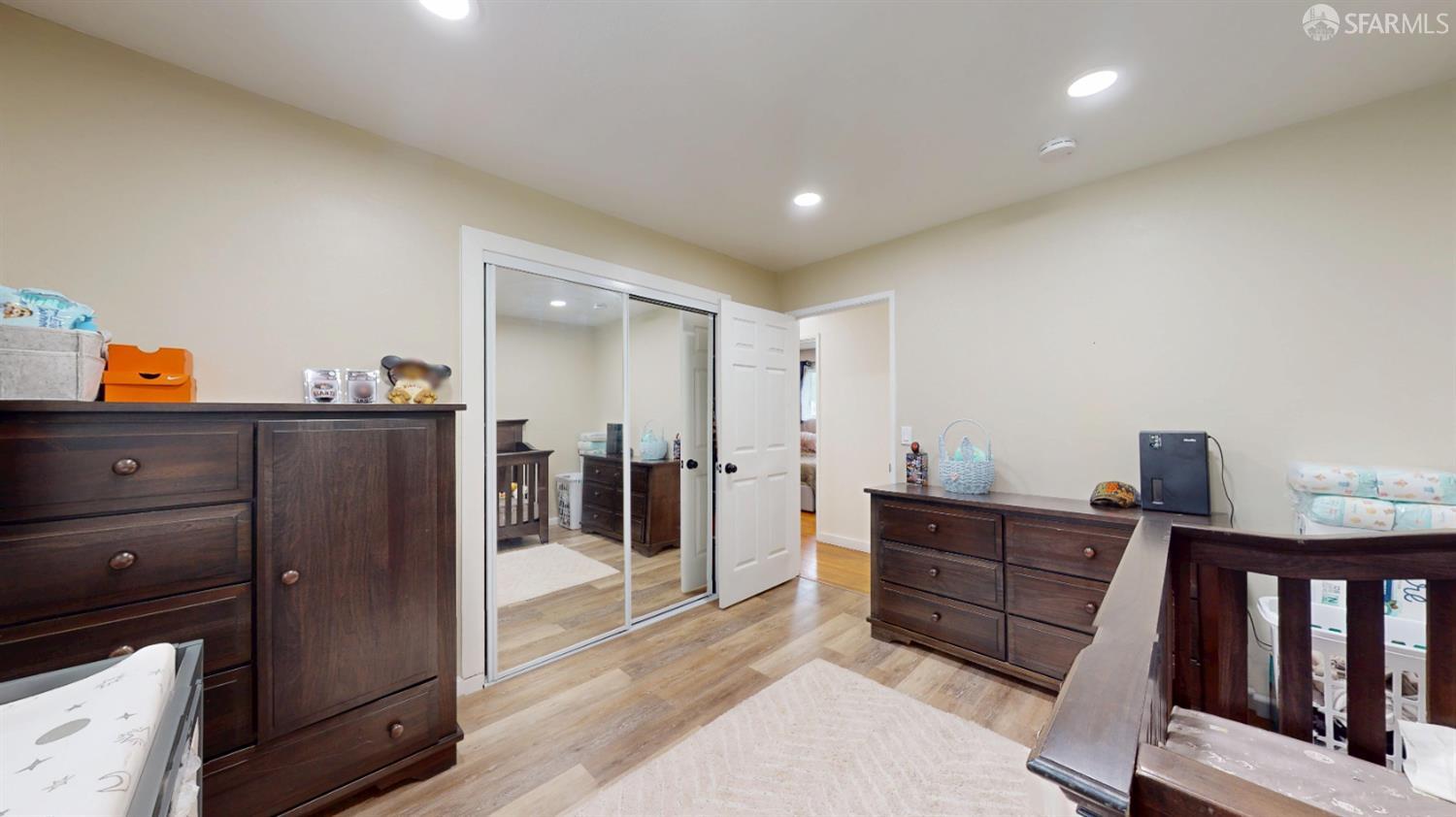 1155 Crespi Drive Pacifica, CA 94044 - Photo 14 of 29 bedroom featuring a closet, light wood-style floors, and recessed lighting
