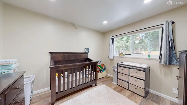 a bathroom with a toilet sink and shower