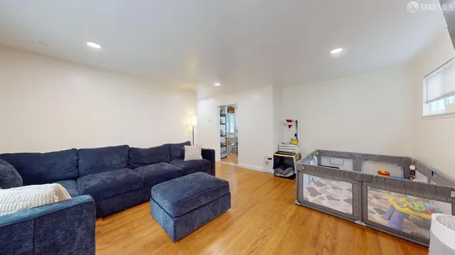 a living room with furniture and a couch