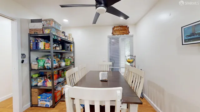 a view of a hallway with workspace and toys