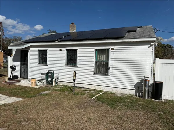 a front view of house with yard
