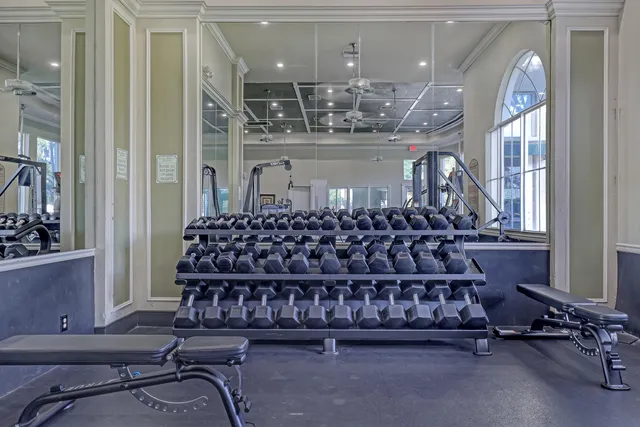an aerial view of residential houses with outdoor space and street view